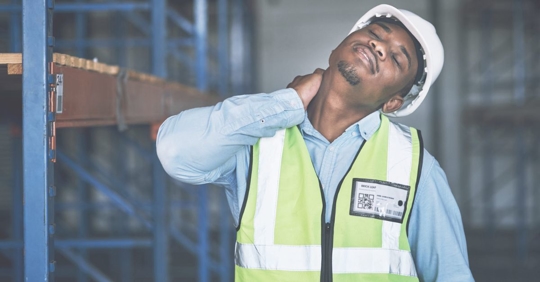 construction worker holding back of neck