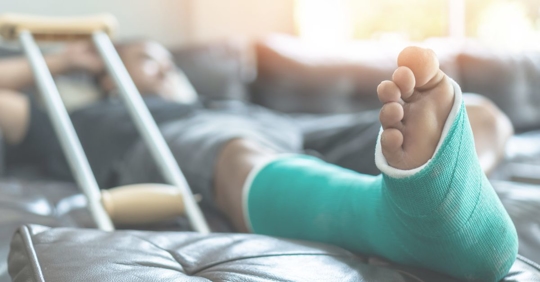 an injured person with an ankle cast
